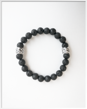 De lavasteen armband met 2 tribal kralen