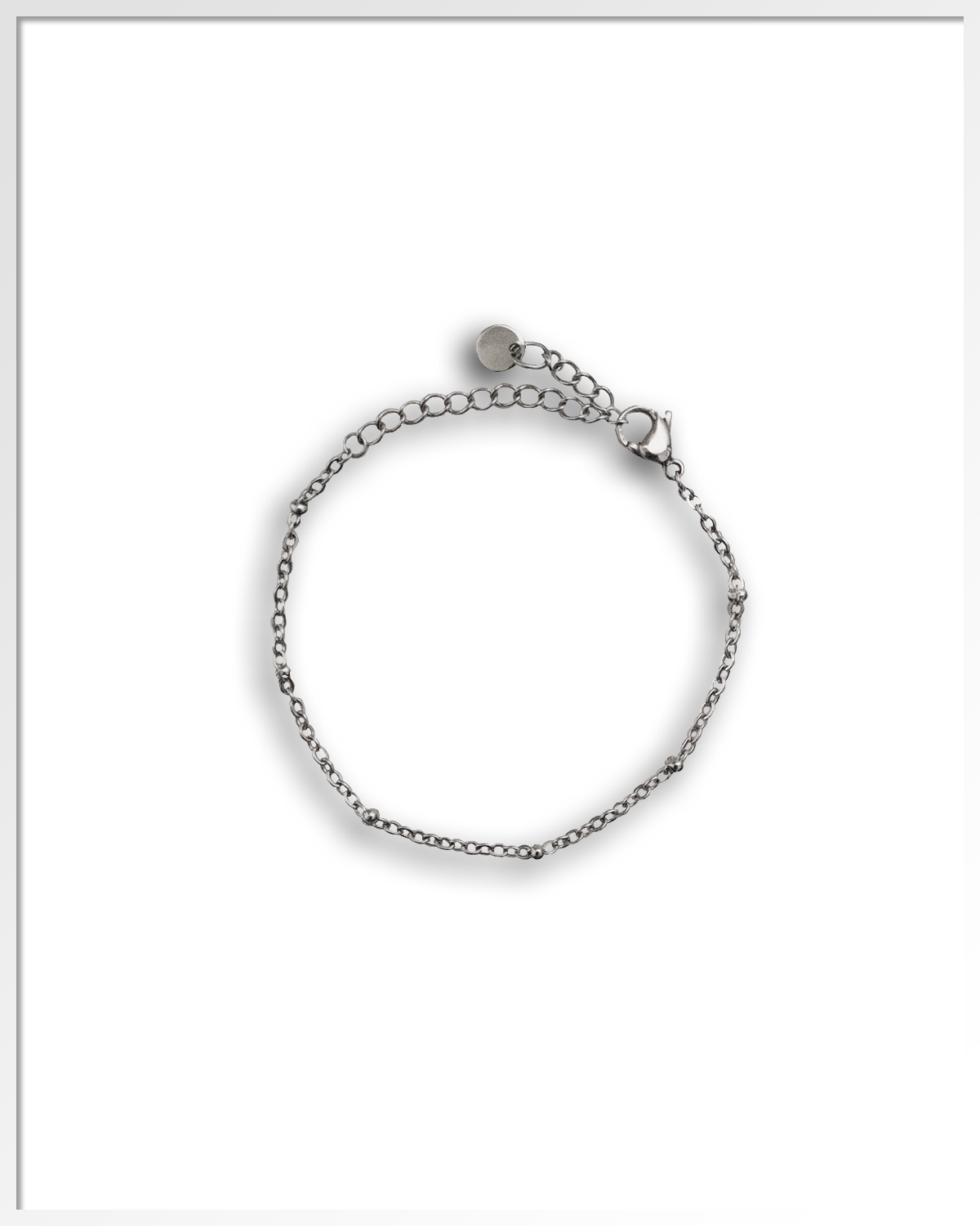 10903 - Schakelarmband met bolletjes